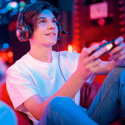 A guy playing game on console, wearing headset